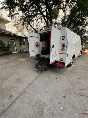 Magnet Plumbing service vehicle on-site for Grease Trap Cleaning in Cypress Meadow